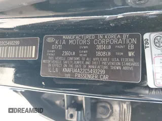 2012 Kia Forte EX with VIN KNAFU4A22C5493299, listed as a IAAI auction lot 41784831 with 218,479 mi miles. Bid and sale history available at carsss.com. Image 9.