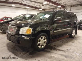 2004 GMC Envoy SLE with VIN 1GKDT13S542265104, listed as a IAAI auction lot 41884797 with 154,190 mi miles. Bid and sale history available at carsss.com. Image 22.