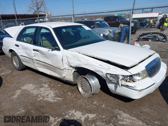 2002 Mercury Grand Marquis LS Premium z VIN 2MEFM75W92X641347, wystawiony jako IAAI lot #41701179 z przebiegiem 79 942 mil mil oraz . Historia ofert i sprzedaży dostępna na DreamBid. Obrazek 1.