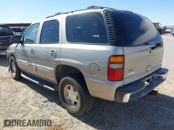 2003 GMC Yukon SLT with VIN 1GKEC13V33R298333, listed as a IAAI auction lot 41582447 with 166,047 mi miles. Bid and sale history available at carsss.com. Image 3.