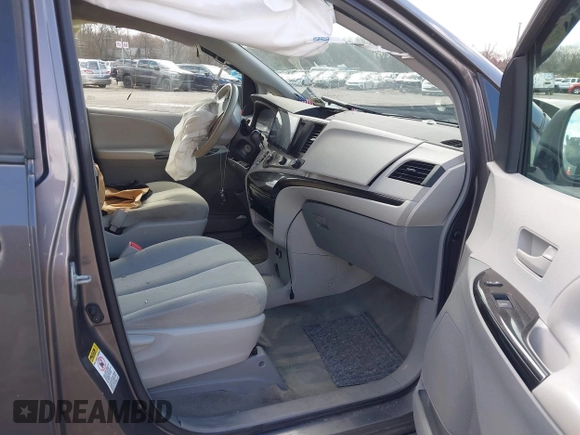 2014 Toyota Sienna L with VIN 5TDZK3DC4ES407928, listed as a IAAI auction lot 41887349 with 208,289 mi miles. Bid and sale history available at carsss.com. Image 5.