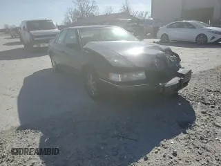 1996 Cadillac Seville Touring STS z VIN 1G6KY5299TU801228, wystawiony jako Copart lot #47304045 z przebiegiem Nie podano mil oraz Szkoda całkowita • Salvage title. Historia ofert i sprzedaży dostępna na DreamBid. Obrazek 11.