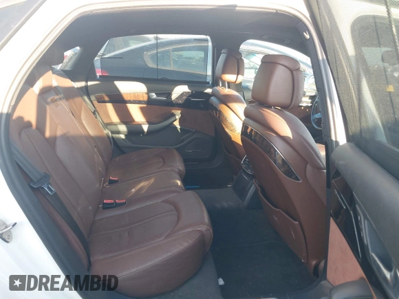 2013 Audi A8 3.0L z VIN WAURGAFD5DN009804, wystawiony jako IAAI lot #42642523 z przebiegiem 141 252 mil mil oraz . Historia ofert i sprzedaży dostępna na DreamBid. Obrazek 8.