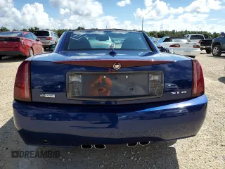 2004 Cadillac XLR z VIN 1G6YV34A045601459, wystawiony jako Copart lot #74522994 z przebiegiem Nie podano mil oraz Szkody całkowita. Historia ofert i sprzedaży dostępna na DreamBid. Obrazek 6.