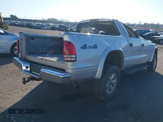 2004 Dodge Dakota SLT with VIN 1D7HG48N24S699380, listed as a IAAI auction lot 41436819 with 1 mi miles. Bid and sale history available at carsss.com. Image 4.