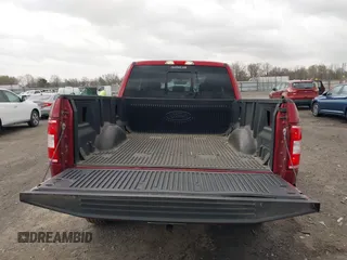 2018 Ford F-150 XL with VIN 1FTFX1E51JKF98962, listed as a IAAI auction lot 41827587 with 128,031 mi miles and . Bid and sale history available at DreamBid. Image 16.