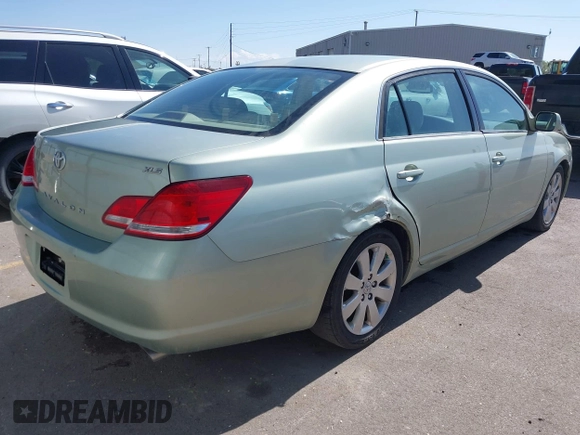 2007 Toyota Avalon XL with VIN 4T1BK36B07U239298, listed as a IAAI auction lot 42046413 with 221,018 mi miles. Bid and sale history available at carsss.com. Image 4.