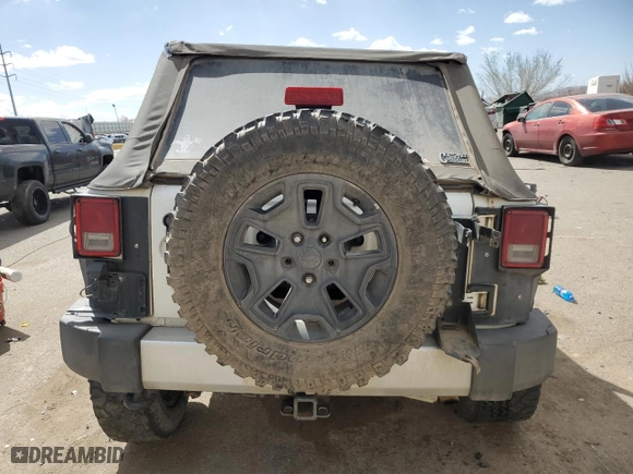 2013 Jeep Wrangler Unlimited Sahara with VIN 1C4BJWEG9DL588029, listed as a Copart auction lot 47665425 with 130,818 mi miles and Salvage Title. Bid and sale history available at carsss.com. Image 6.