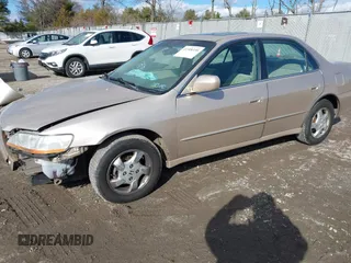 2000 Honda Accord EX z VIN 1HGCG6672YA069215, wystawiony jako IAAI lot #41508330 z przebiegiem 138 721 mil mil oraz . Historia ofert i sprzedaży dostępna na DreamBid. Obrazek 18.