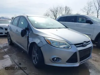 2013 Ford Focus SE with VIN 1FADP3K27DL203880, listed as a IAAI auction lot 41951733 with 131,880 mi miles. Bid and sale history available at carsss.com. Image 1.