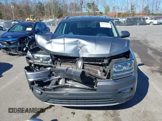 2018 Volkswagen Atlas SE with VIN 1V2CR2CA0JC571988, listed as a IAAI auction lot 41848862 with 96,426 mi miles and . Bid and sale history available at DreamBid. Image 12.