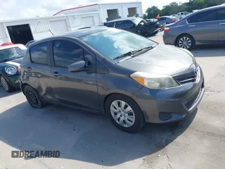 2012 Toyota Yaris L with VIN JTDKTUD38CD540219, listed as a IAAI auction lot 42091750 with 152,878 mi miles. Bid and sale history available at carsss.com. Image 13.