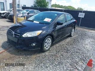 2012 Ford Focus SE with VIN 1FAHP3F21CL390012, listed as a IAAI auction lot 42634521 with 214,617 mi miles and . Bid and sale history available at DreamBid. Image 2.