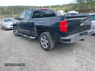 2014 Chevrolet Silverado 1500 LT with VIN 1GCRCREH3EZ138815, listed as a IAAI auction lot 41883354 with 214,630 mi miles. Bid and sale history available at carsss.com. Image 3.