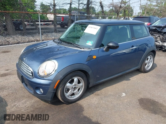 2010 MINI Hardtop with VIN WMWMF3C57ATZ61622, listed as a IAAI auction lot 42467602 with 94,937 mi miles and . Bid and sale history available at DreamBid. Image 2.