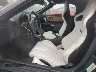 2001 Toyota MR2 z VIN JTDFR320810037734, wystawiony jako Copart lot #51645125 z przebiegiem 269 261 mil mil oraz Szkody całkowita. Historia ofert i sprzedaży dostępna na DreamBid. Obrazek 7.