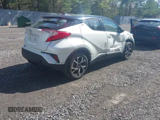 2019 Toyota C-HR XLE with VIN NMTKHMBX5KR097682, listed as a IAAI auction lot 42145372 with 11,003 mi miles and . Bid and sale history available at DreamBid. Image 4.