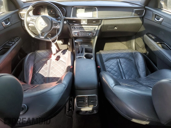 2018 Kia Optima SX with VIN 5XXGV4L25JG230508, listed as a Copart auction lot 56423135 with 100,575 mi miles and Salvage title. Bid and sale history available at DreamBid. Image 8.