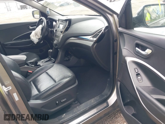 2013 Hyundai Santa Fe Sport z VIN 5XYZUDLA3DG114436, wystawiony jako IAAI lot #42084871 z przebiegiem 96 000 mil mil oraz . Historia ofert i sprzedaży dostępna na DreamBid. Obrazek 5.