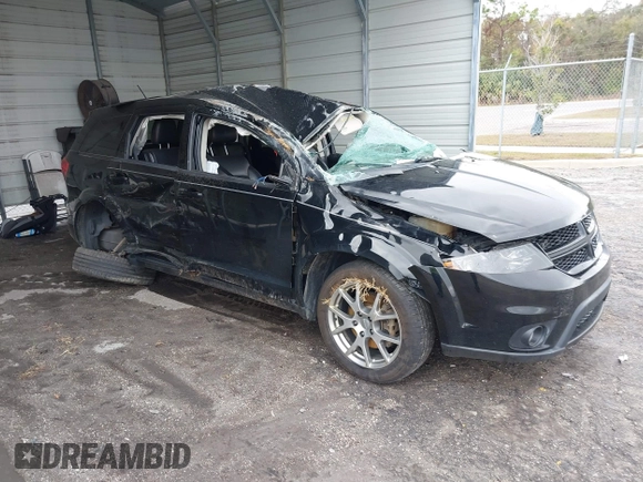 2015 Dodge Journey R/T with VIN 3C4PDDEG3FT555035, listed as a IAAI auction lot 41067936 with 214,244 mi miles and . Bid and sale history available at DreamBid. Image 1.