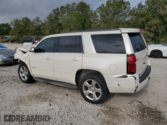 2015 Chevrolet Tahoe LT with VIN 1GNSCBKC9FR220574, listed as a Copart auction lot 54788555 with 244,491 mi miles and Salvage title. Bid and sale history available at DreamBid. Image 2.