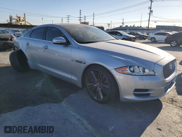 2011 Jaguar XJ with VIN SAJWA1JC0BMV13347, listed as a Copart auction lot 87699375 with Not Provided miles and Salvage Title. Bid and sale history available at DreamBid. Image 4.
