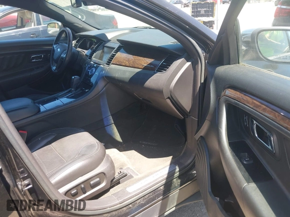 2015 Ford Taurus Limited with VIN 1FAHP2F82FG100260, listed as a IAAI auction lot 42677412 with 138,082 mi miles and . Bid and sale history available at DreamBid. Image 5.