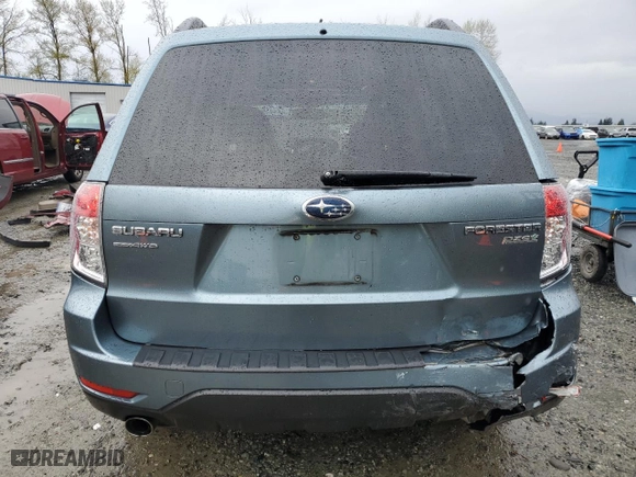 2010 Subaru Forester 2.5X Limited with VIN JF2SH6DC1AH751637, listed as a Copart auction lot 52436445 with 127,352 mi miles and Salvage Title. Bid and sale history available at carsss.com. Image 6.