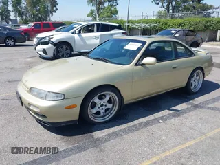 1995 Nissan 240SX z VIN JN1AS44D3SW013539, wystawiony jako IAAI lot #42291213 z przebiegiem 198 479 mil mil oraz . Historia ofert i sprzedaży dostępna na DreamBid. Obrazek 2.
