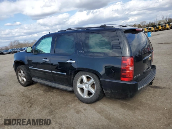 2012 Chevrolet Tahoe LTZ with VIN 1GNSKCE08CR322969, listed as a Copart auction lot 50604555 with 165,190 mi miles and Salvage title. Bid and sale history available at DreamBid. Image 2.