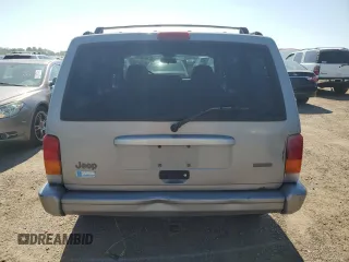 2001 Jeep Cherokee Sport z VIN 1J4FF58S61L540796, wystawiony jako Copart lot #62384895 z przebiegiem 209 294 mil mil oraz Czysty tytuł • Clean title. Historia ofert i sprzedaży dostępna na DreamBid. Obrazek 6.