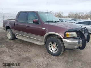 2001 Ford F-150 SuperCrew XLT with VIN 1FTRW08L91KC64859, listed as a IAAI auction lot 41676096 with 156,989 mi miles. Bid and sale history available at carsss.com. Image 1.