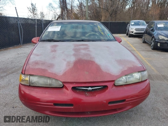 1997 Ford Thunderbird LX z VIN 1FALP62W8VH161871, wystawiony jako IAAI lot #41018103 z przebiegiem 138 915 mil mil oraz . Historia ofert i sprzedaży dostępna na DreamBid. Obrazek 6.