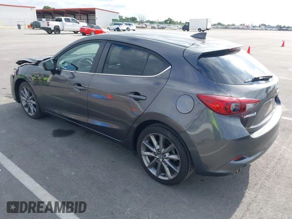2018 Mazda 3 Touring with VIN 3MZBN1L32JM268582, listed as a IAAI auction lot 42072435 with 61,417 mi miles. Bid and sale history available at carsss.com. Image 3.