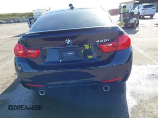 2015 BMW 4 Series 435i with VIN WBA4B1C54FD418309, listed as a IAAI auction lot 42099401 with 119,982 mi miles and . Bid and sale history available at carsss.com. Image 16.