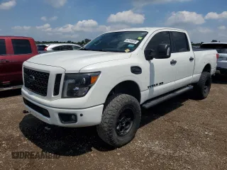 2018 Nissan Titan Platinum Reserve with VIN 1N6BA1F45JN528964, listed as a Copart auction lot 62143025 with Not provided miles and Clean title. Bid and sale history available at DreamBid. Image 1.