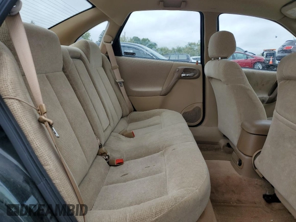 2001 Saturn LS z VIN 1G8JU54F41Y581083, wystawiony jako Copart lot #73123714 z przebiegiem 98 500 mil mil oraz Szkody całkowita. Historia ofert i sprzedaży dostępna na DreamBid. Obrazek 11.