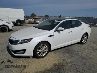 2013 Kia Optima EX z VIN 5XXGN4A73DG124982, wystawiony jako Copart lot #59822095 z przebiegiem 188 458 mil mil oraz Czysty tytuł • Clean title. Historia ofert i sprzedaży dostępna na DreamBid. Obrazek 1.