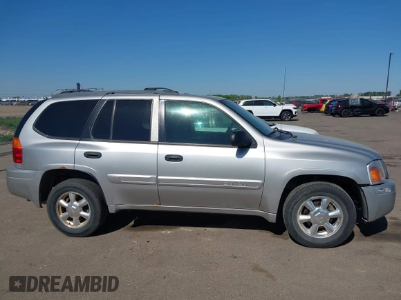 2004 GMC Envoy SLT z VIN 1GKDT13S642449872, wystawiony jako IAAI lot #42236157 z przebiegiem 205 194 mil mil oraz . Historia ofert i sprzedaży dostępna na DreamBid. Obrazek 14.