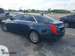 2016 Cadillac CTS Sedan RWD with VIN 1G6AP5SX8G0119984, listed as a IAAI auction lot 42098257 with 98,593 mi miles. Bid and sale history available at carsss.com. Image 3.