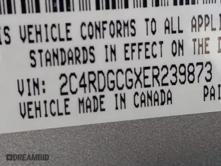 2014 Dodge Grand Caravan SXT 30th Anniversary with VIN 2C4RDGCGXER239873, listed as a IAAI auction lot 41891976 with 151,740 mi miles. Bid and sale history available at carsss.com. Image 9.