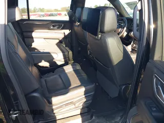2021 Chevrolet Suburban RST z VIN 1GNSCEKD2MR340613, wystawiony jako IAAI lot #41853016 z przebiegiem 77 498 mil mil oraz . Historia ofert i sprzedaży dostępna na DreamBid. Obrazek 8.