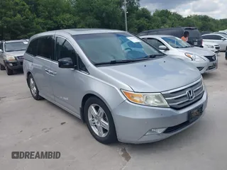 2012 Honda Odyssey Touring with VIN 5FNRL5H92CB110391, listed as a IAAI auction lot 42605166 with Not provided miles and . Bid and sale history available at DreamBid. Image 1.