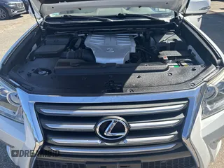 2014 Lexus GX with VIN JTJBM7FX1E5090308, listed as a IAAI auction lot 42130546 with 132,247 mi miles. Bid and sale history available at carsss.com. Image 10.