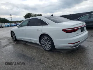 2019 Audi A8 z VIN WAU8DAF88KN004066, wystawiony jako Copart lot #56928395 z przebiegiem 93 157 mil mil oraz Czysty tytuł • Clean title. Historia ofert i sprzedaży dostępna na DreamBid. Obrazek 2.