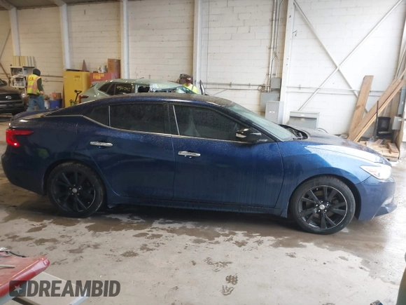 2016 Nissan Maxima SV z VIN 1N4AA6AP6GC449746, wystawiony jako IAAI lot #41971947 z przebiegiem 110 323 mil mil oraz . Historia ofert i sprzedaży dostępna na DreamBid. Obrazek 13.