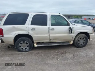 2004 Cadillac Escalade z VIN 1GYEK63N04R207168, wystawiony jako IAAI lot #42348203 z przebiegiem 251 847 mil mil oraz . Historia ofert i sprzedaży dostępna na DreamBid. Obrazek 6.