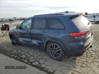 2021 Jeep Grand Cherokee Trailhawk with VIN 1C4RJFLG0MC525273, listed as a Copart auction lot 49632275 with 57,452 mi miles and Salvage title. Bid and sale history available at DreamBid. Image 2.