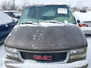 2000 GMC Safari with VIN 1GKDM19W9YB523962, listed as a IAAI auction lot 41253790 with 162,815 mi miles. Bid and sale history available at carsss.com. Image 6.