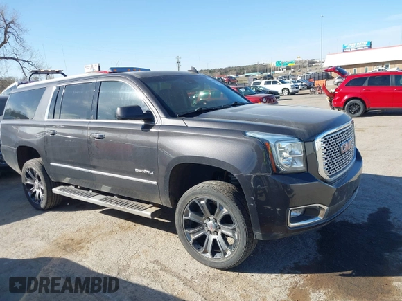 2015 GMC Yukon XL Denali with VIN 1GKS2JKJ9FR634771, listed as a IAAI auction lot 41676218 with 73,271 mi miles. Bid and sale history available at carsss.com. Image 13.